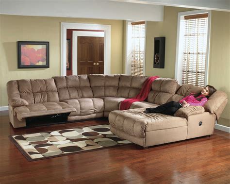 At the touch of a button you’re in the most comfortable, most relaxing spot ever. . Power reclining sleeper sectional with chaise